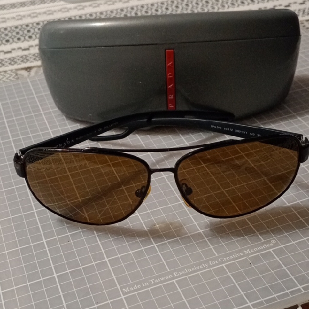 Prada Black Frame Sunglasses with Brown Lenses